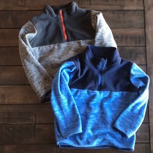 Two 4T half-zip fleece sweaters